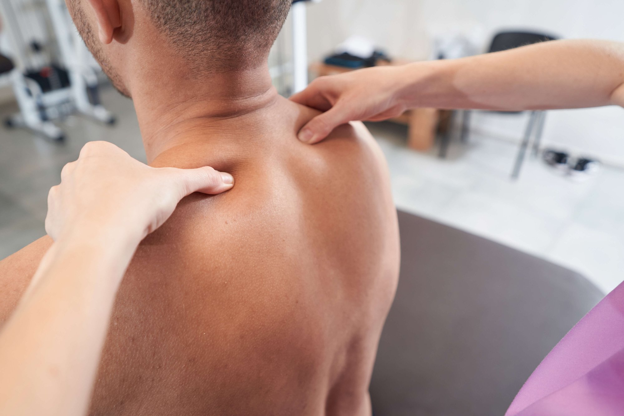 man-reconceiving-massage-treatment-in-physiotherap-2024-10-18-10-05-09-utc